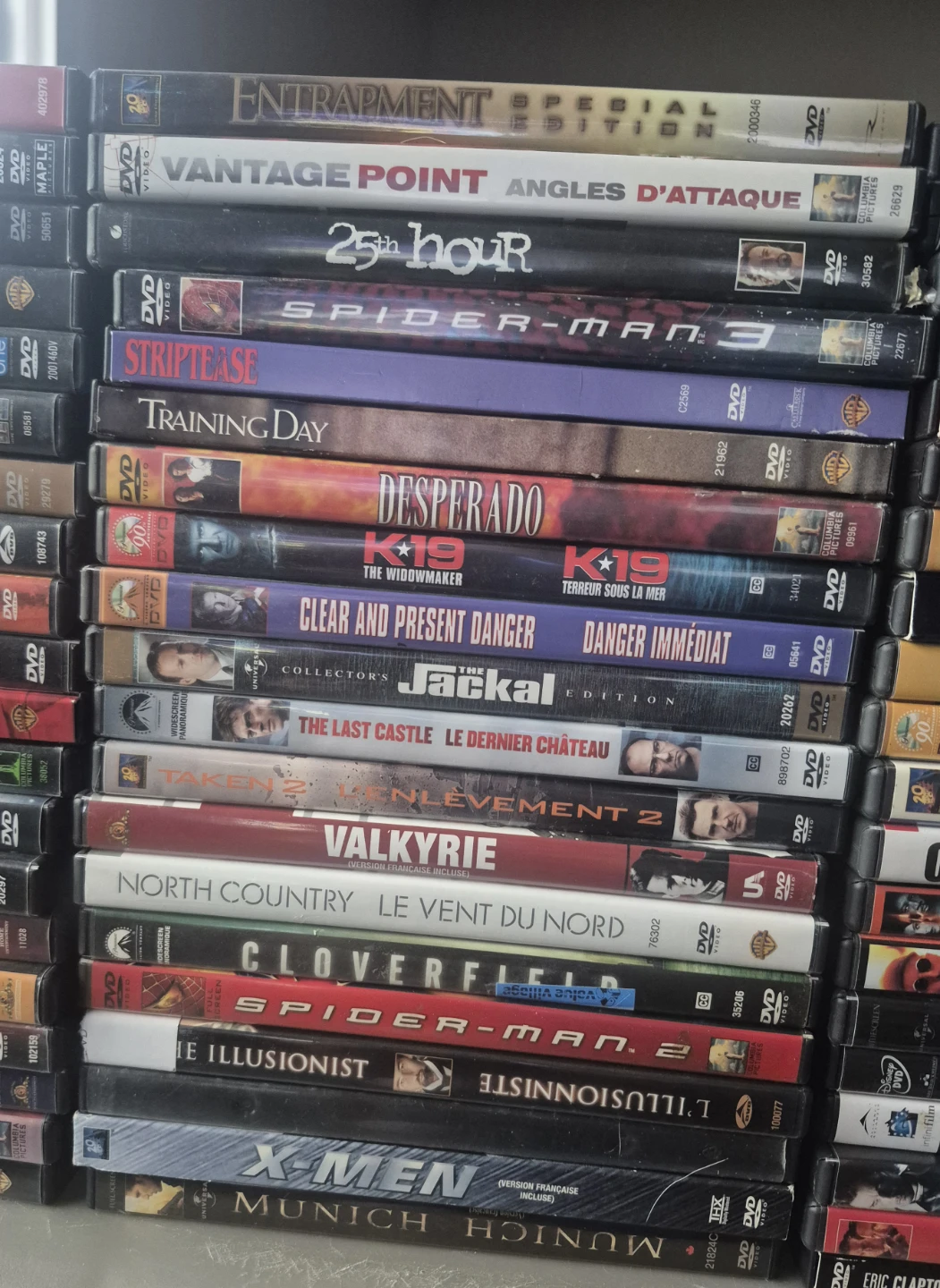 Large collection of 85 action and thriller DVDs - photo 2