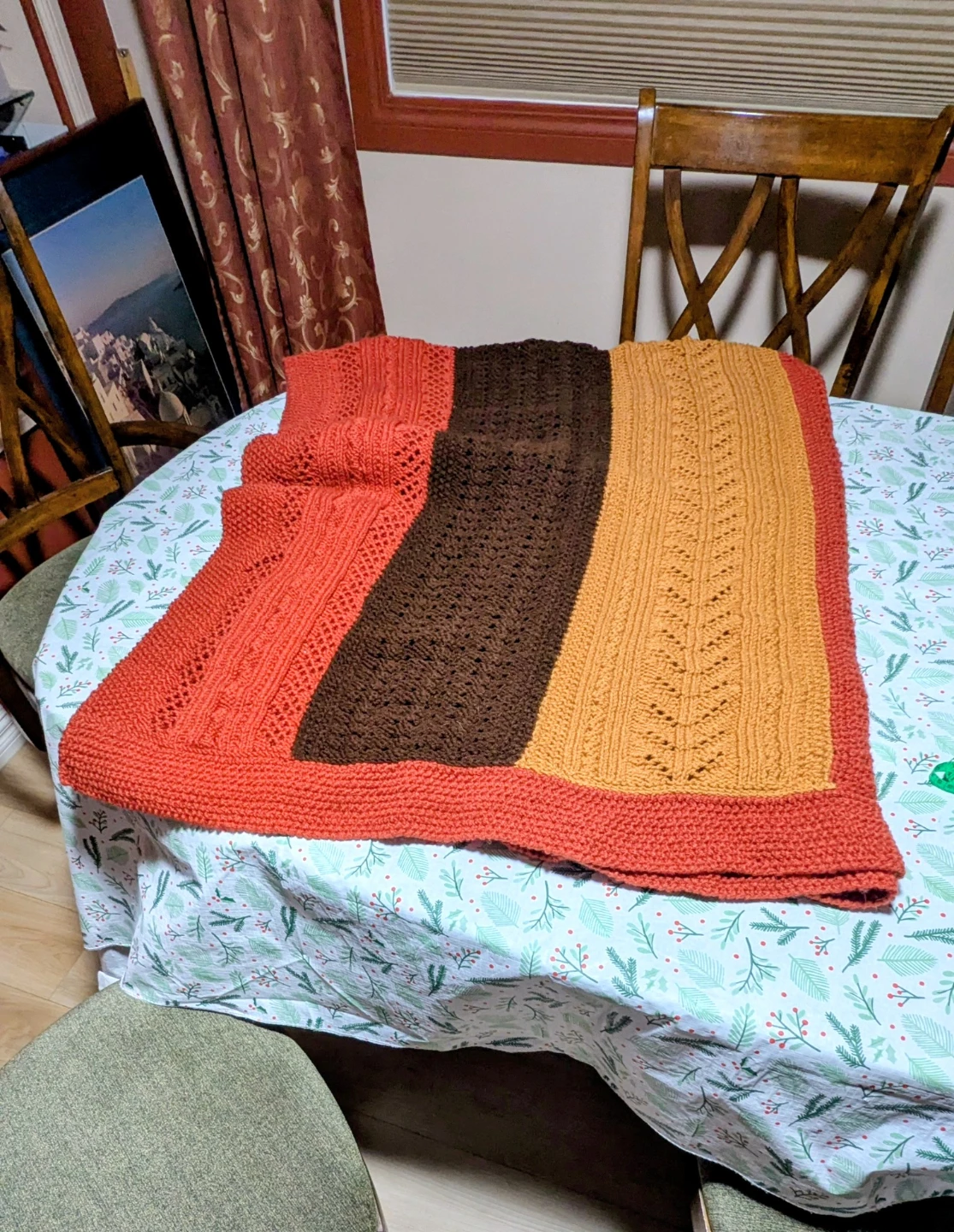 Hand-knitted striped throw blanket