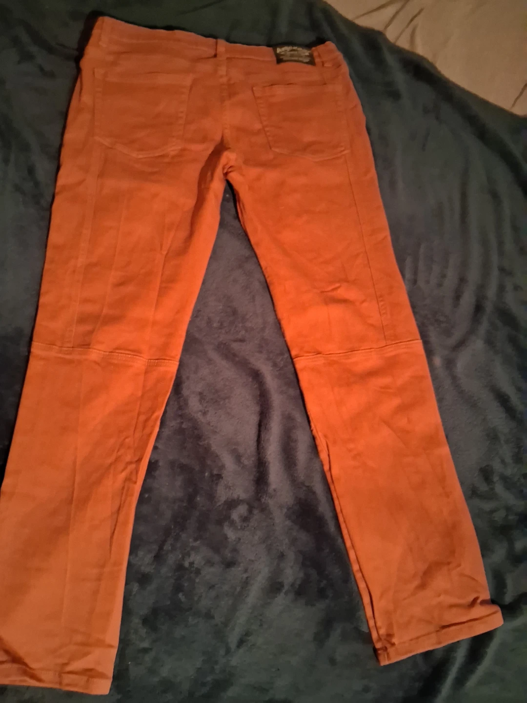 Stylish burnt orange Argonaut Nation biker jeans