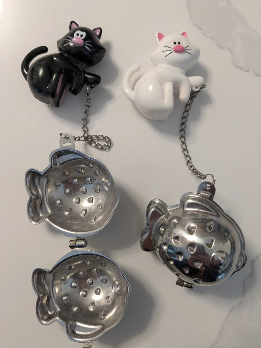 Two cat-themed tea infusers Joie