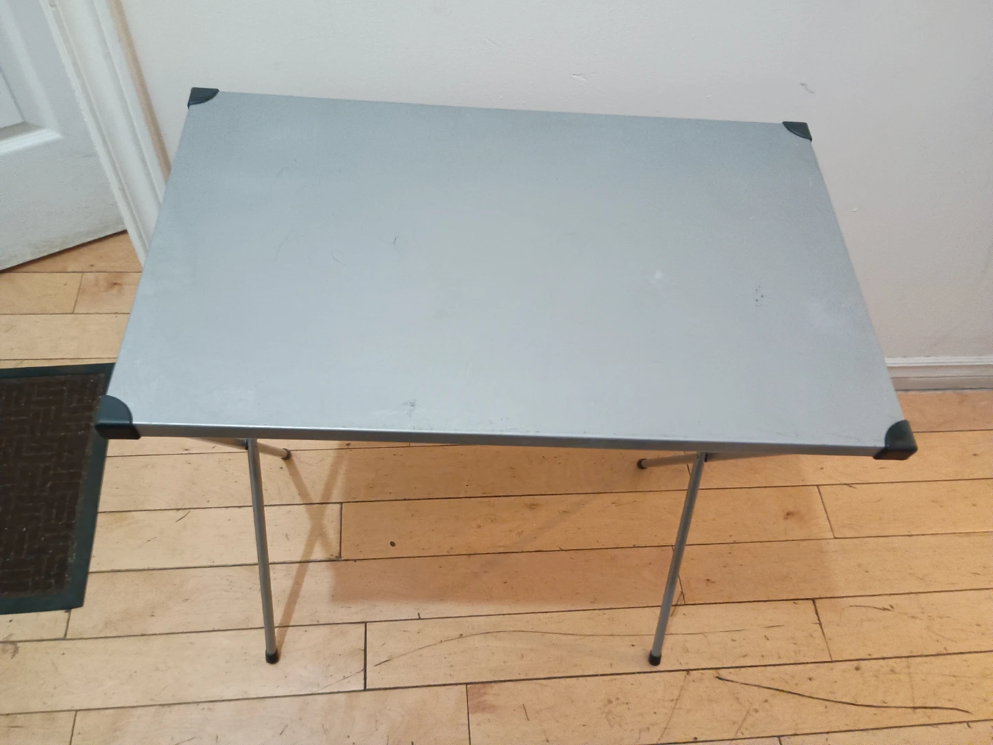 Folding metal utility table