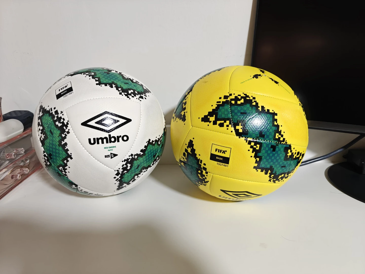 Two Umbro Neo Swerve Size 5 Soccer Balls