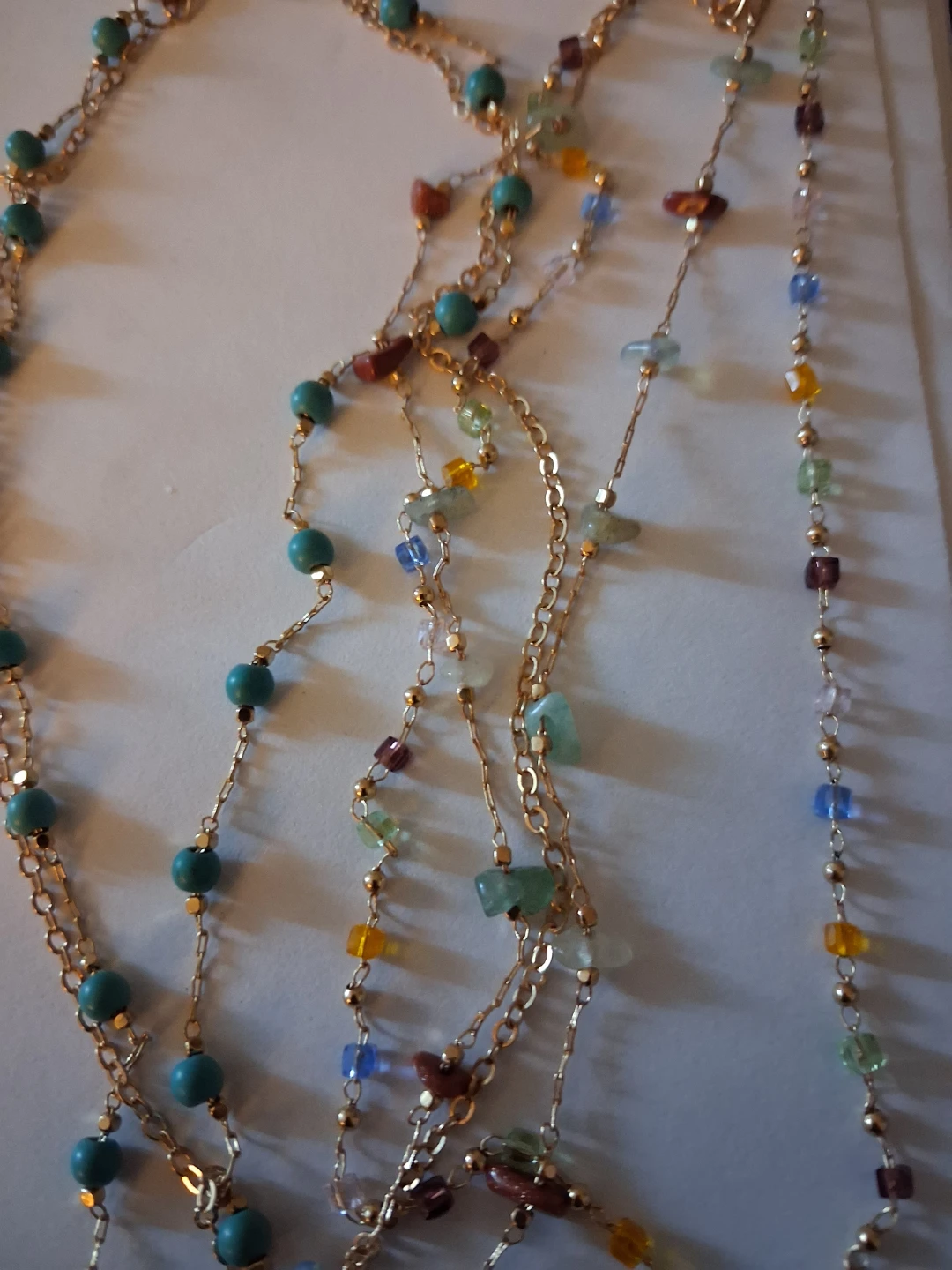 Multi-strand beaded gold-tone necklace