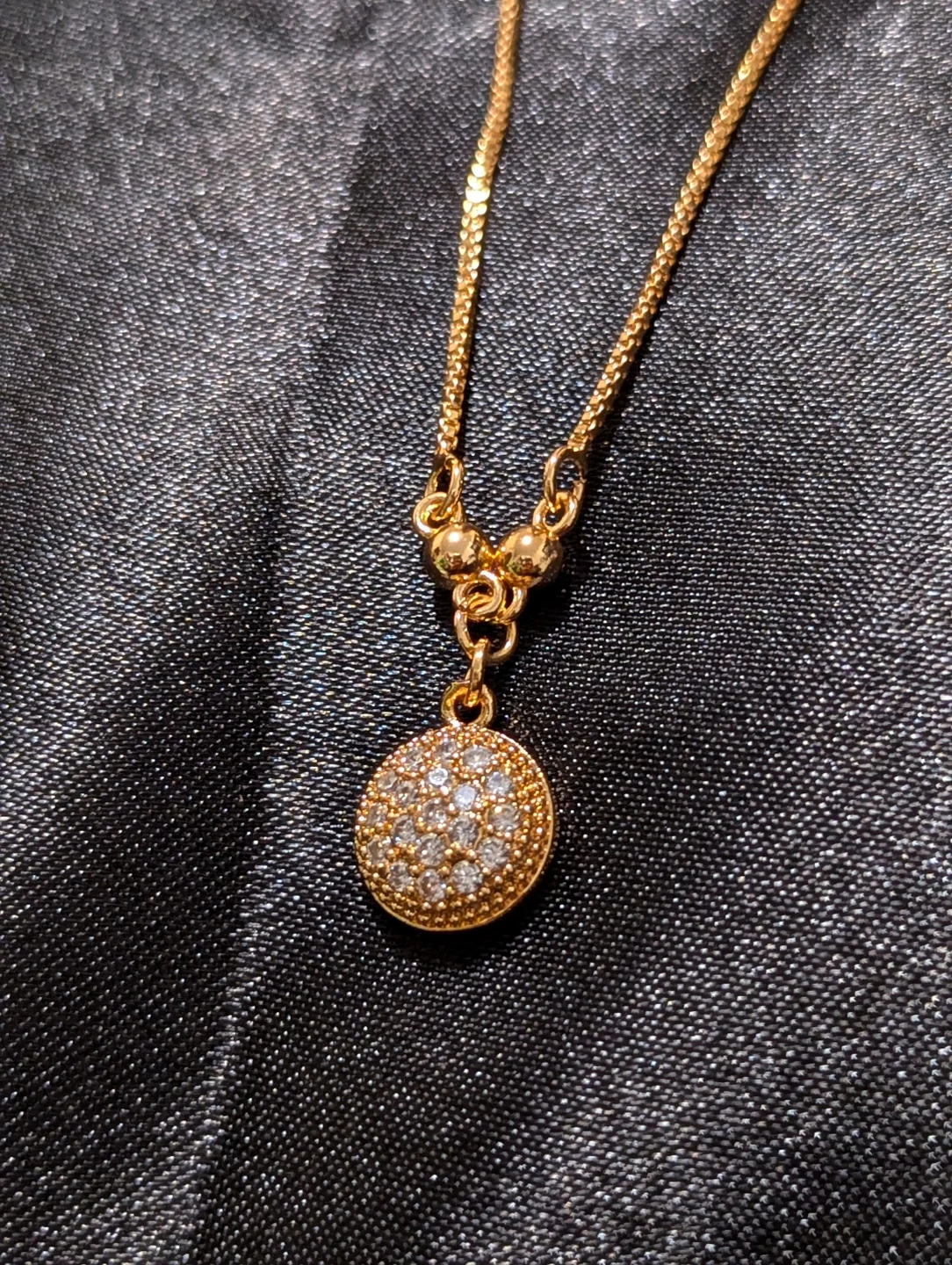 Gold-tone pavé crystal pendant necklace