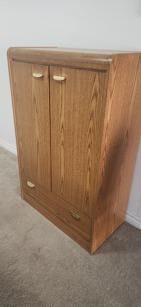 Oak storage armoire with drawers