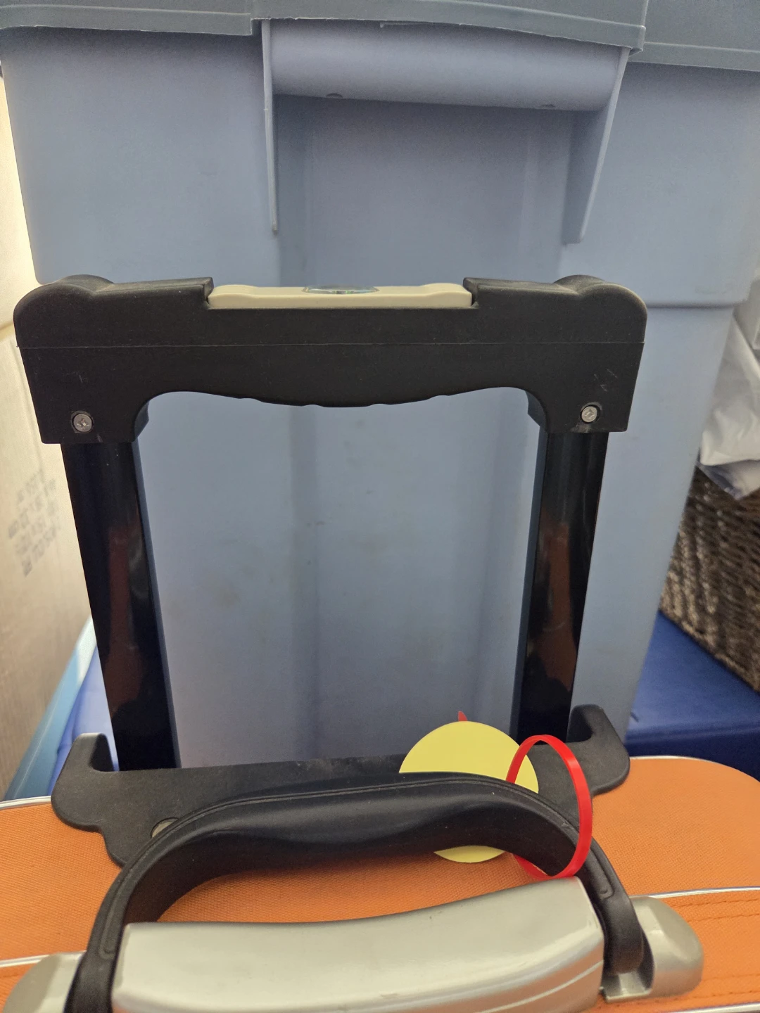 Orange rolling suitcase with combination lock - photo 4