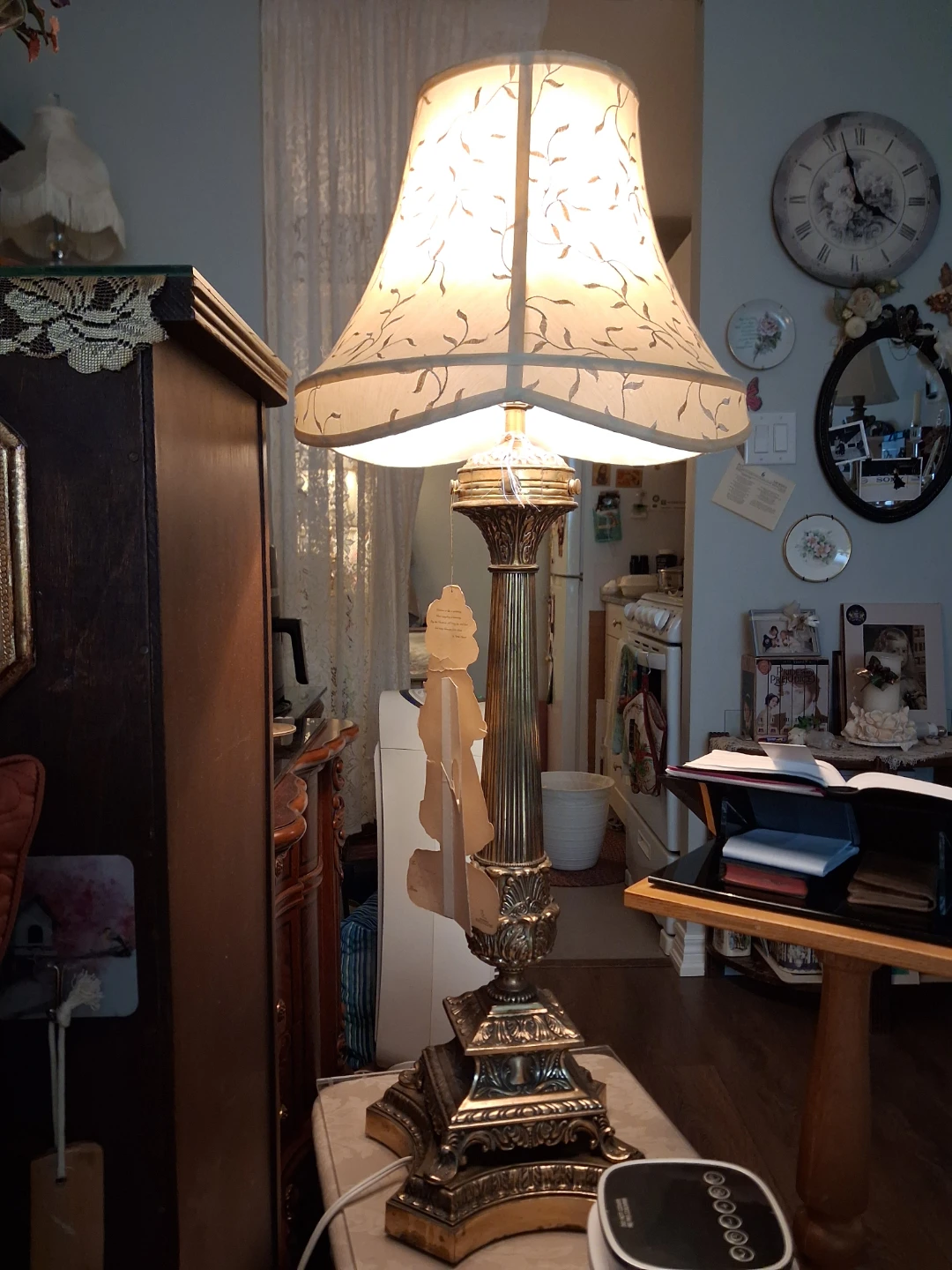 Very tall heavy metal gold toned lamp