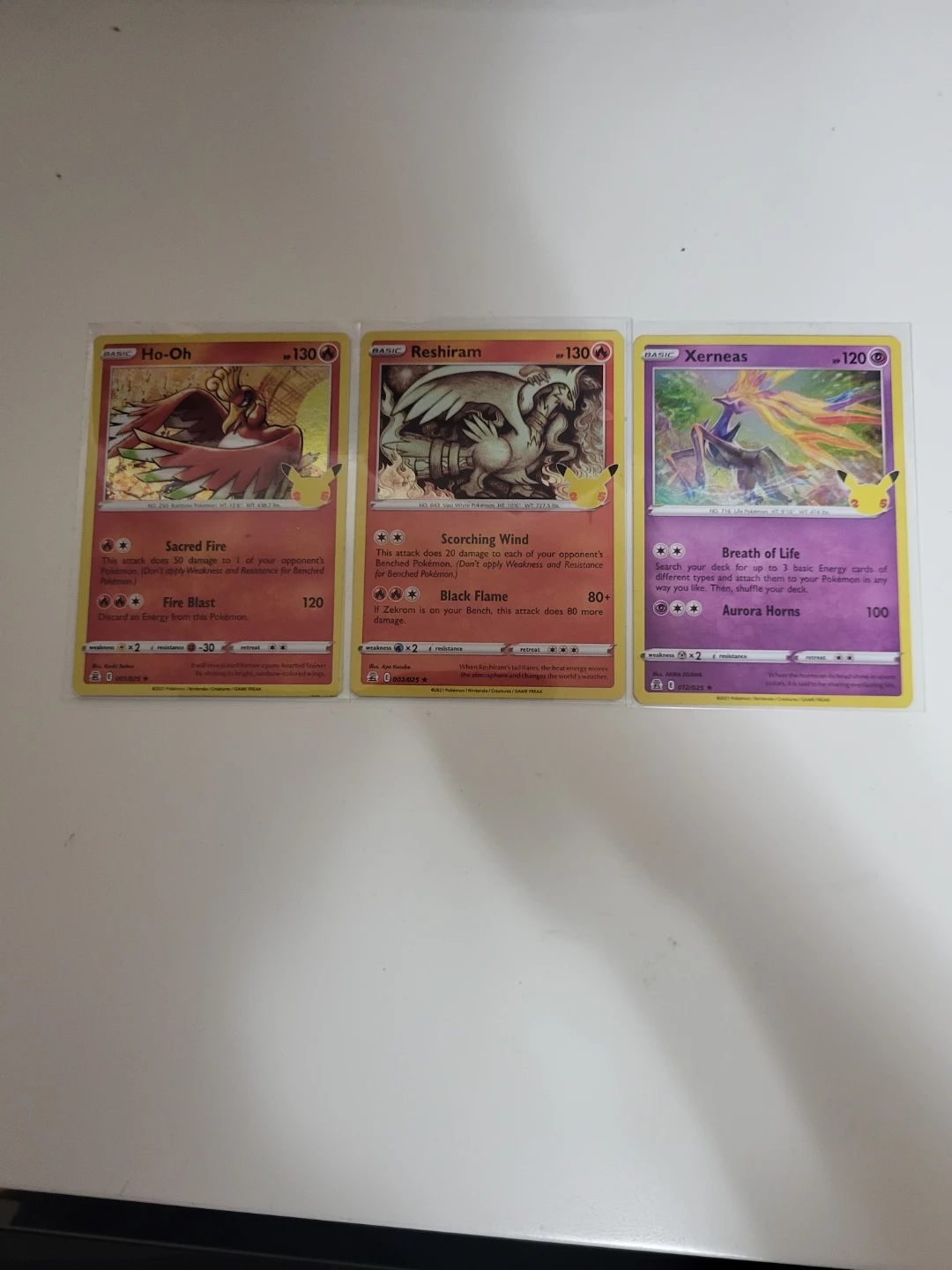 3 Pokemon Celebrations Cards: Ho-Oh, Reshiram, Xerneas