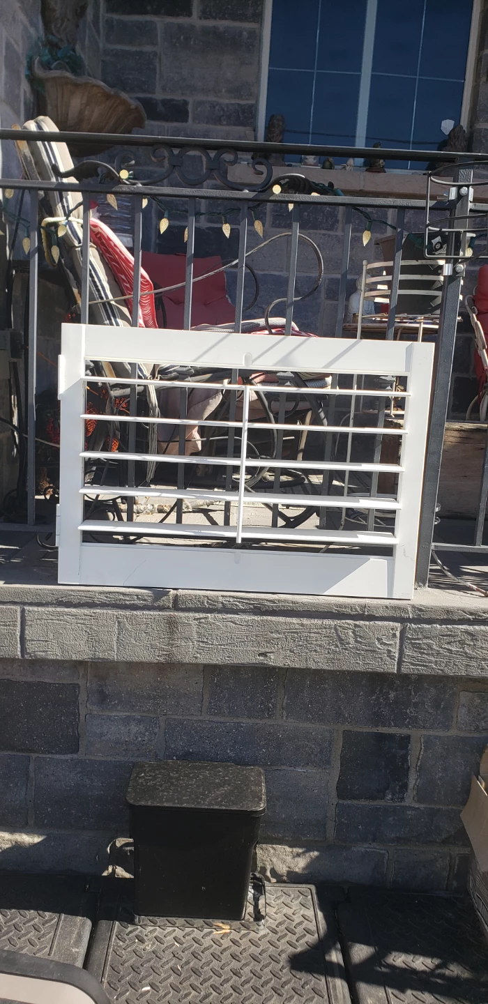 3 White Window Shutters pulled off basement windows
