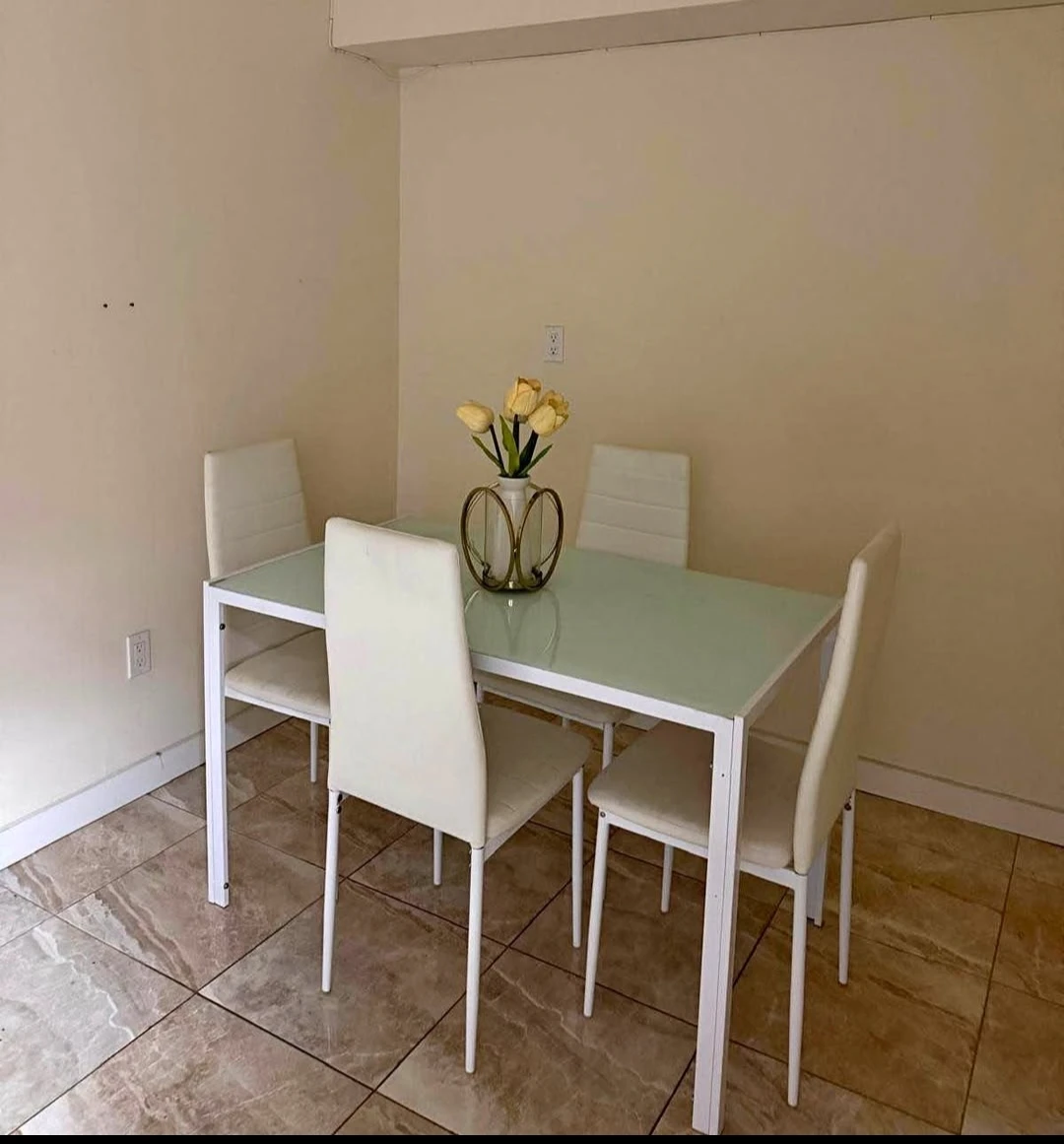 Free  like  new dining table with 4 chairs delivery availabe
