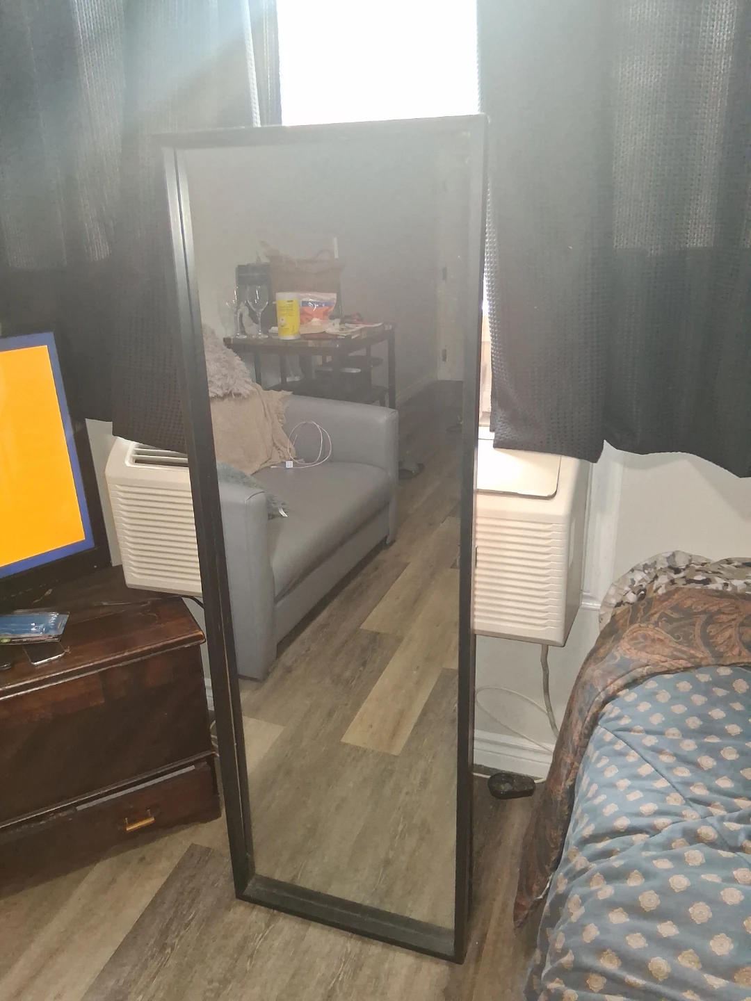 Full length standing mirror with black frame