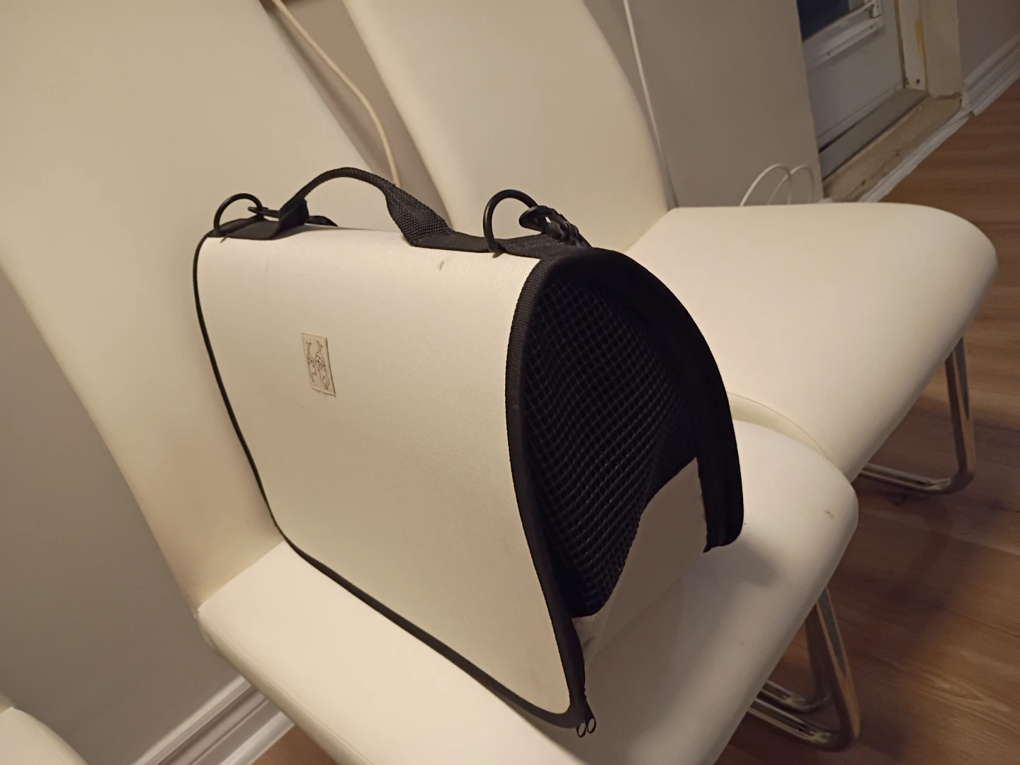Off-white pet carrier bag