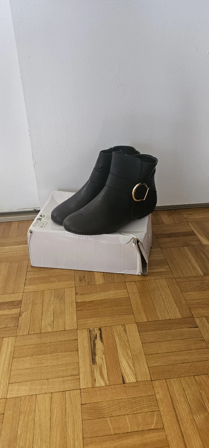 Black ankle boots with gold-tone buckle - photo 2