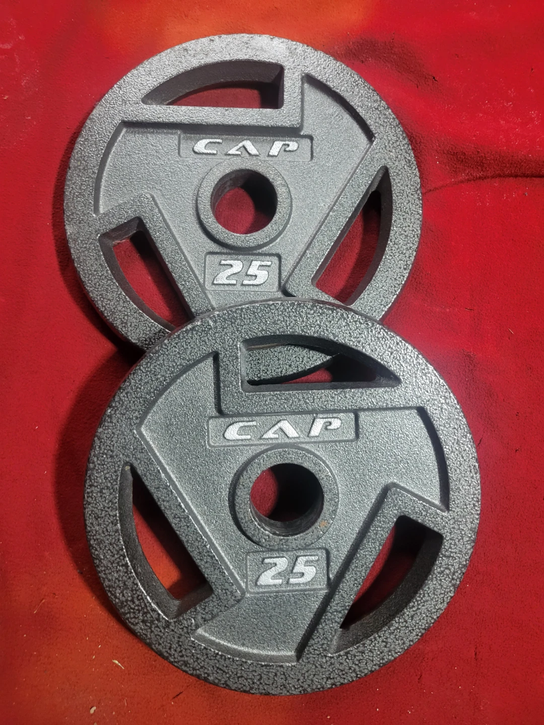 CAPS. OLYMPIC.  2" HOLE  25LB PLATES TOTAL 50lbs