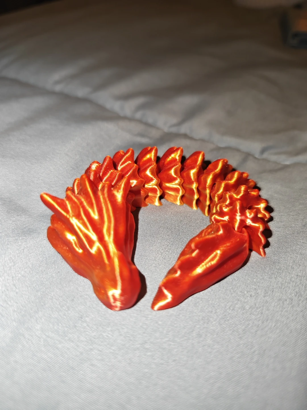 3D Printed Articulated Orange Dragon