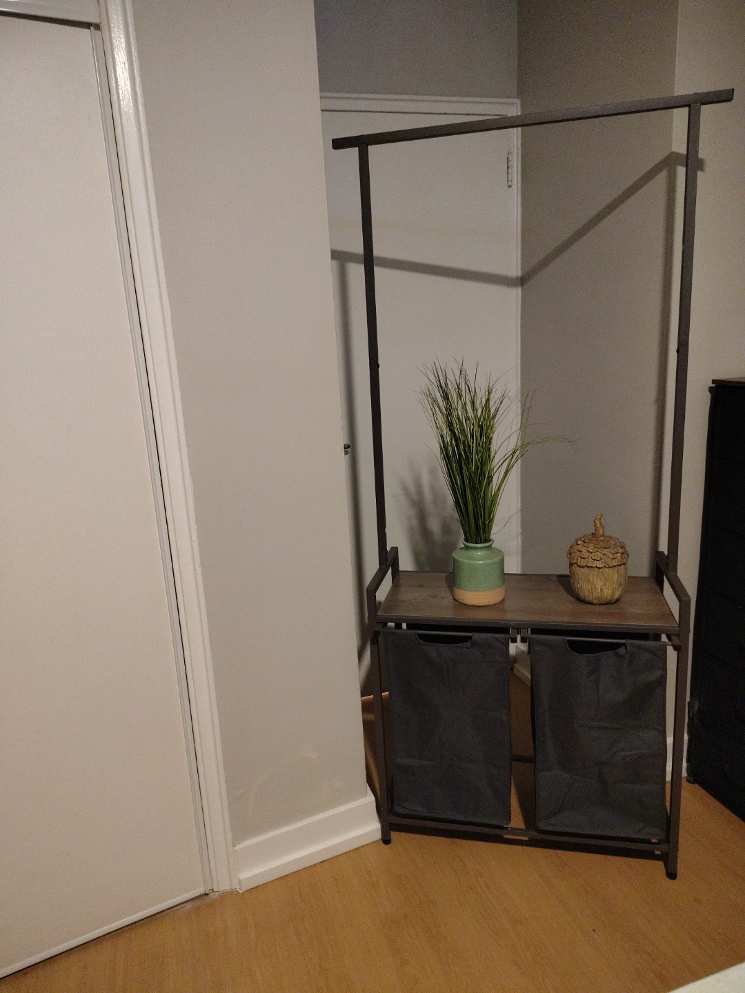 Clothing rack with dual laundry hampers - photo 2
