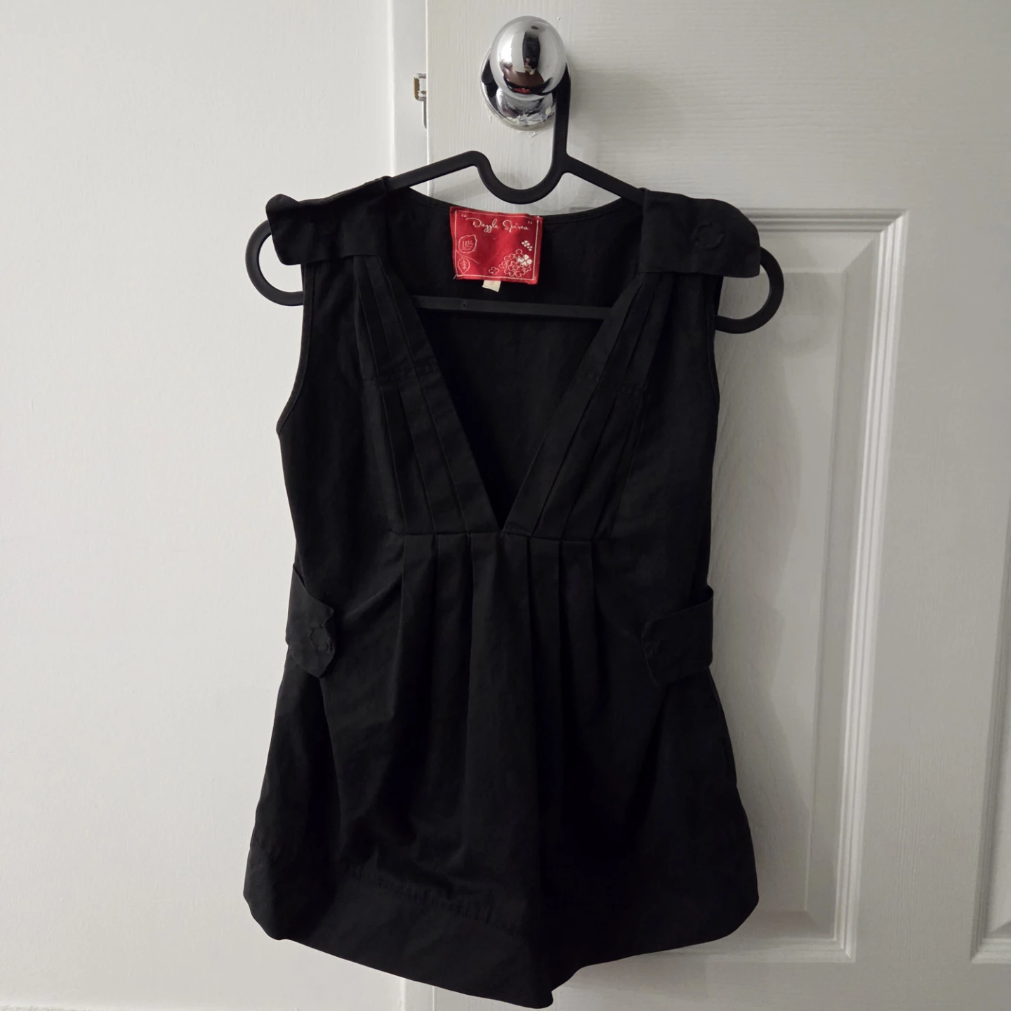 Black sleeveless blouse
