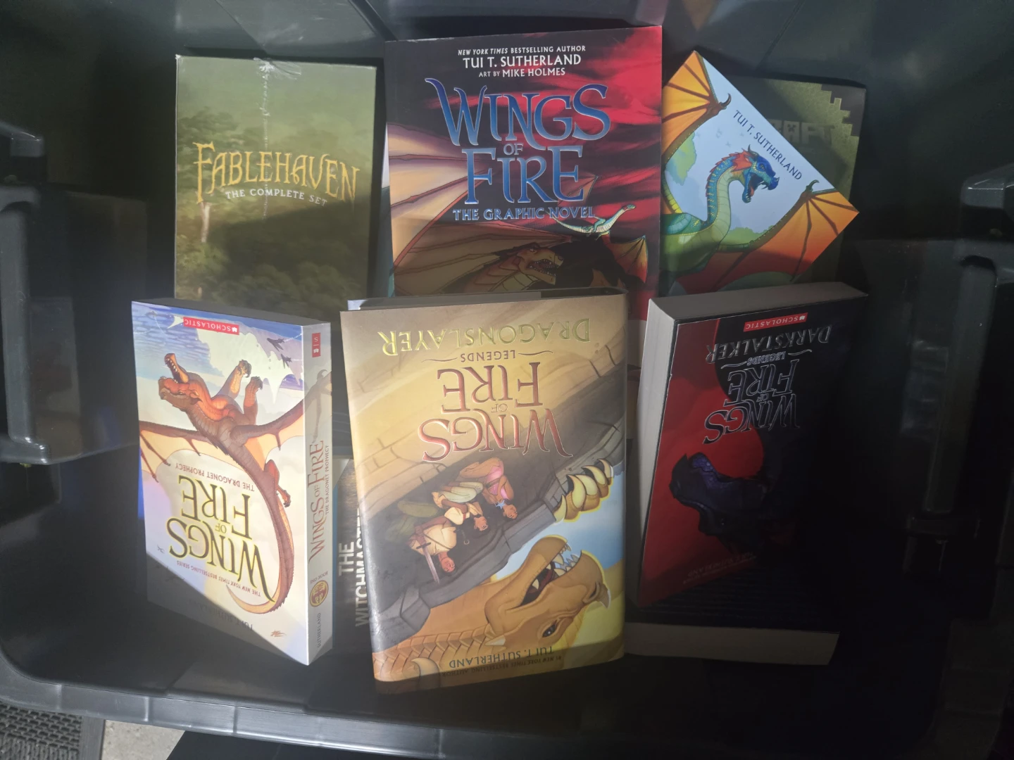 Assorted Wings of Fire Books and graphic novels
