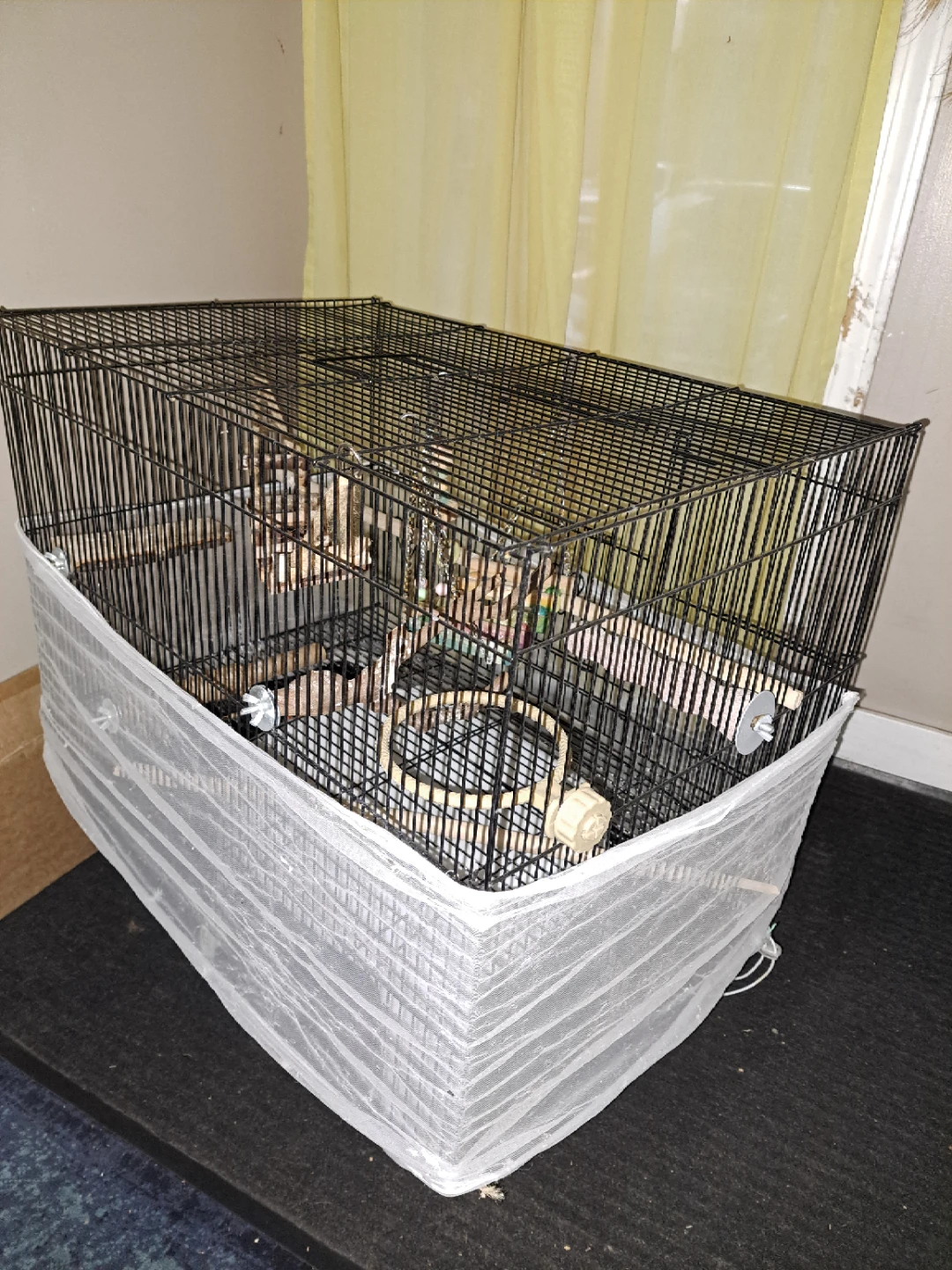 bird cage with perches and toys - photo 2