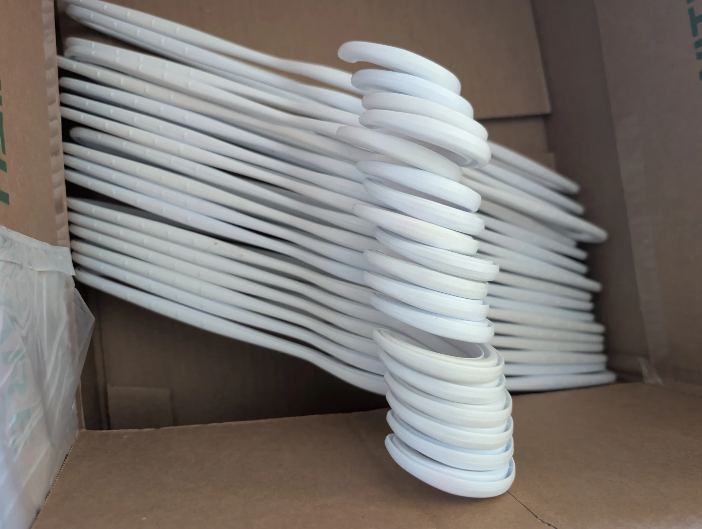 Set of White Plastic Clothes Hangers