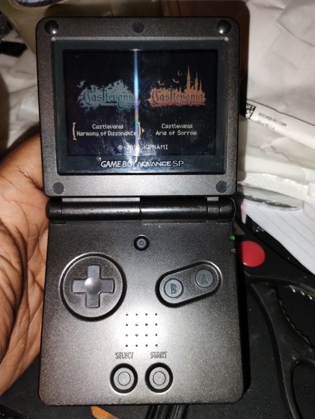 Nintendo Game Boy Advance SP and 6 Game Cartridges