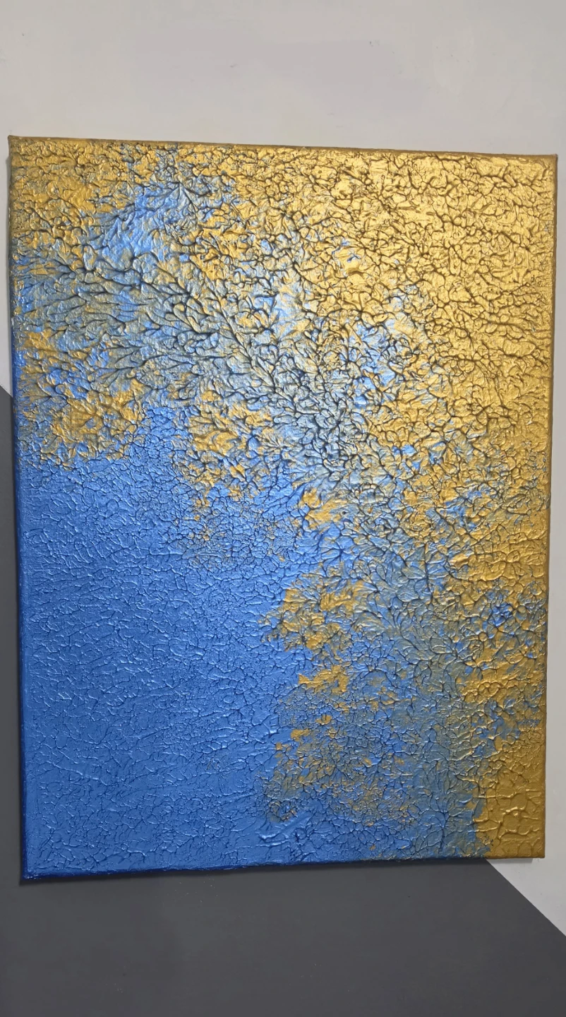 Textured blue and gold abstract canvas art