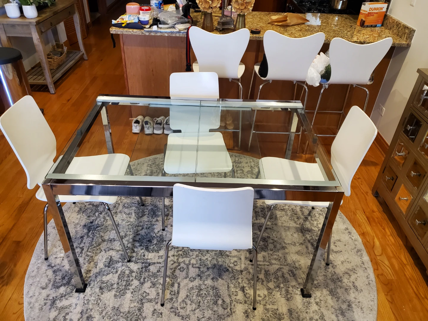 Modern glass dining table with expansion leaves