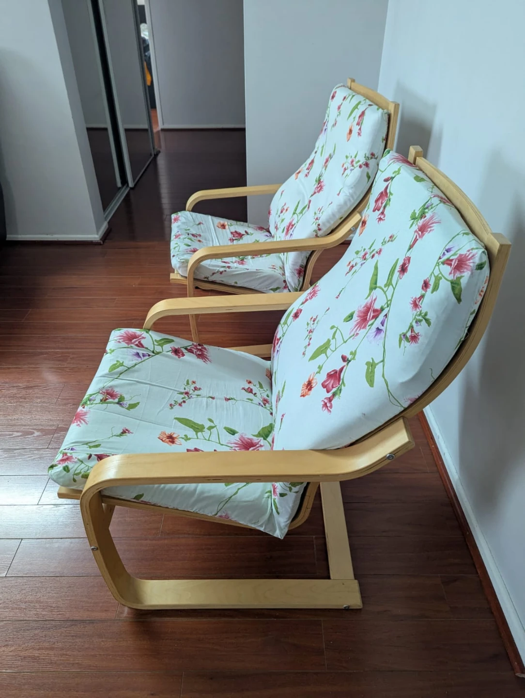 Pair of IKEA Poäng Armchairs – Birch / Floral Cushions