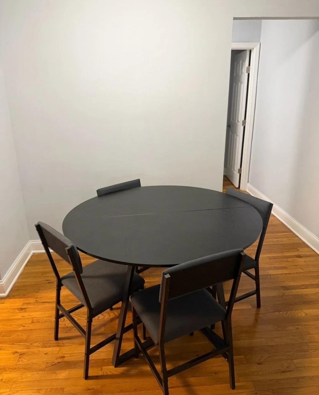 Almost brand new Black Round Dining Table and 4 Chairs Set