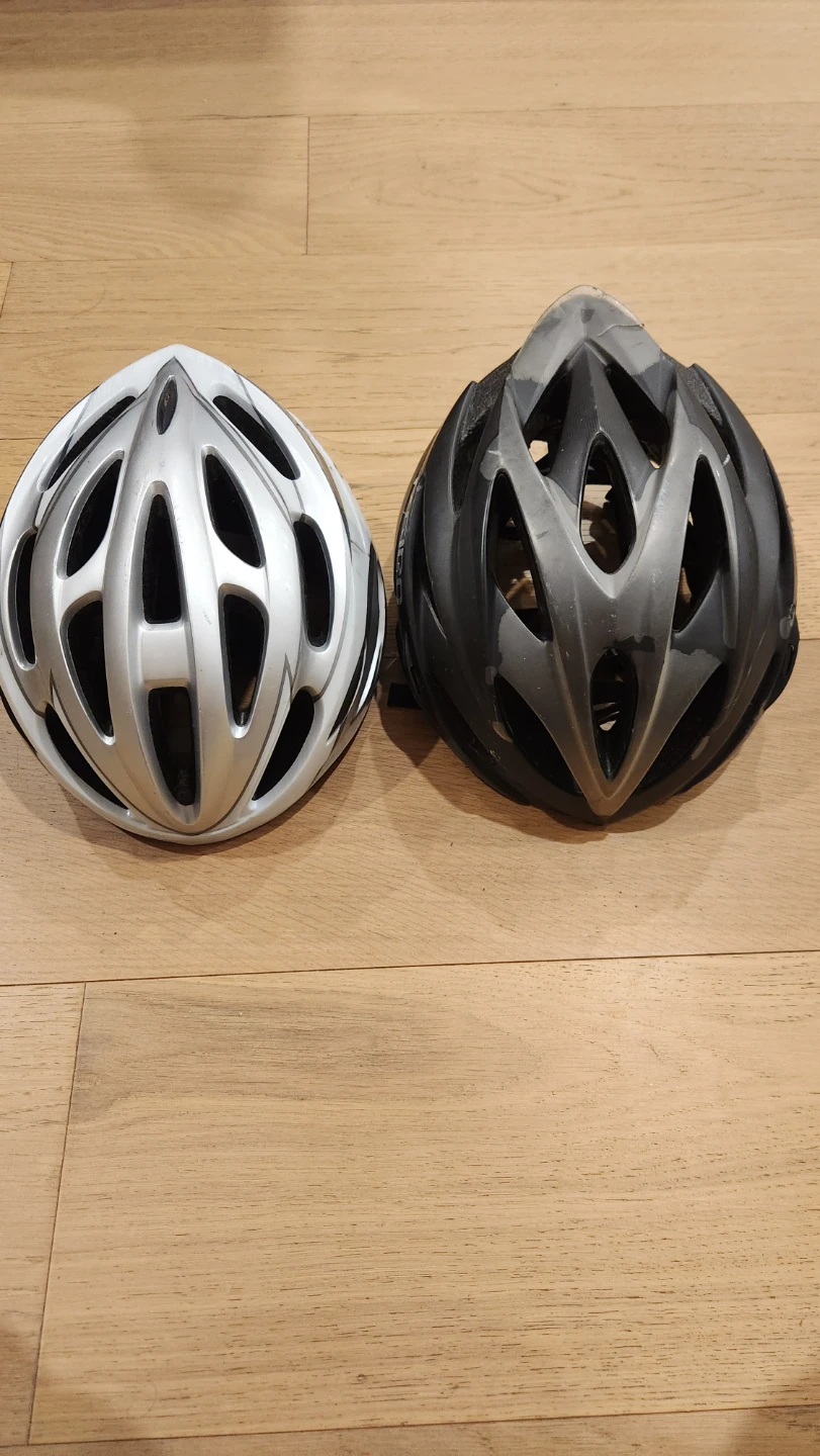 Two bicycle helmets