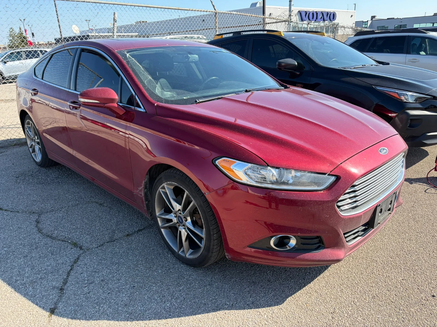 Red Ford Fusion Sedan