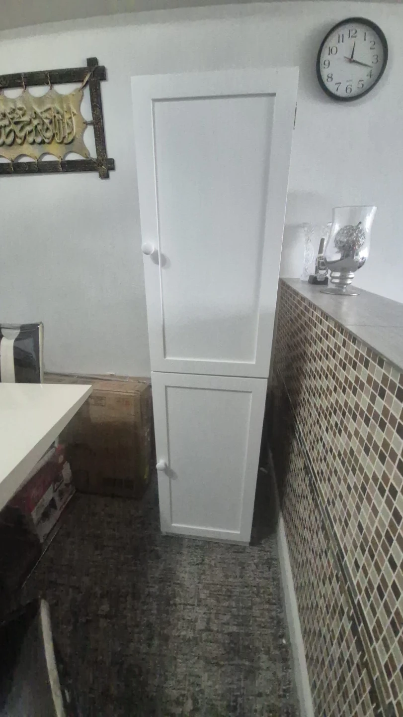 White tall storage cabinet