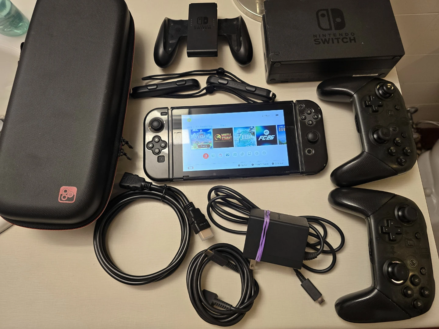 NINTENDO SWITCH + 24 GAMES + 2 PRO CONTROLLERS + 512GB! - photo 2