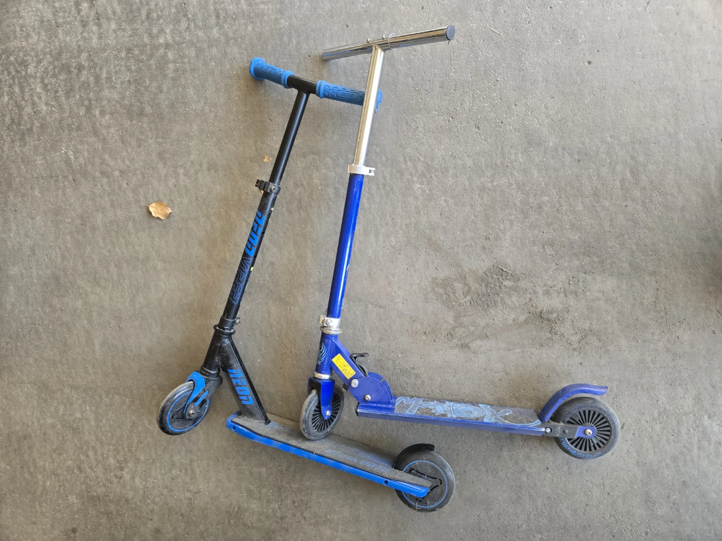 Two Neon Viper Folding Scooters