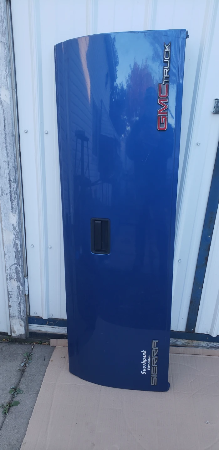GMC Sierra Blue Truck Tailgate