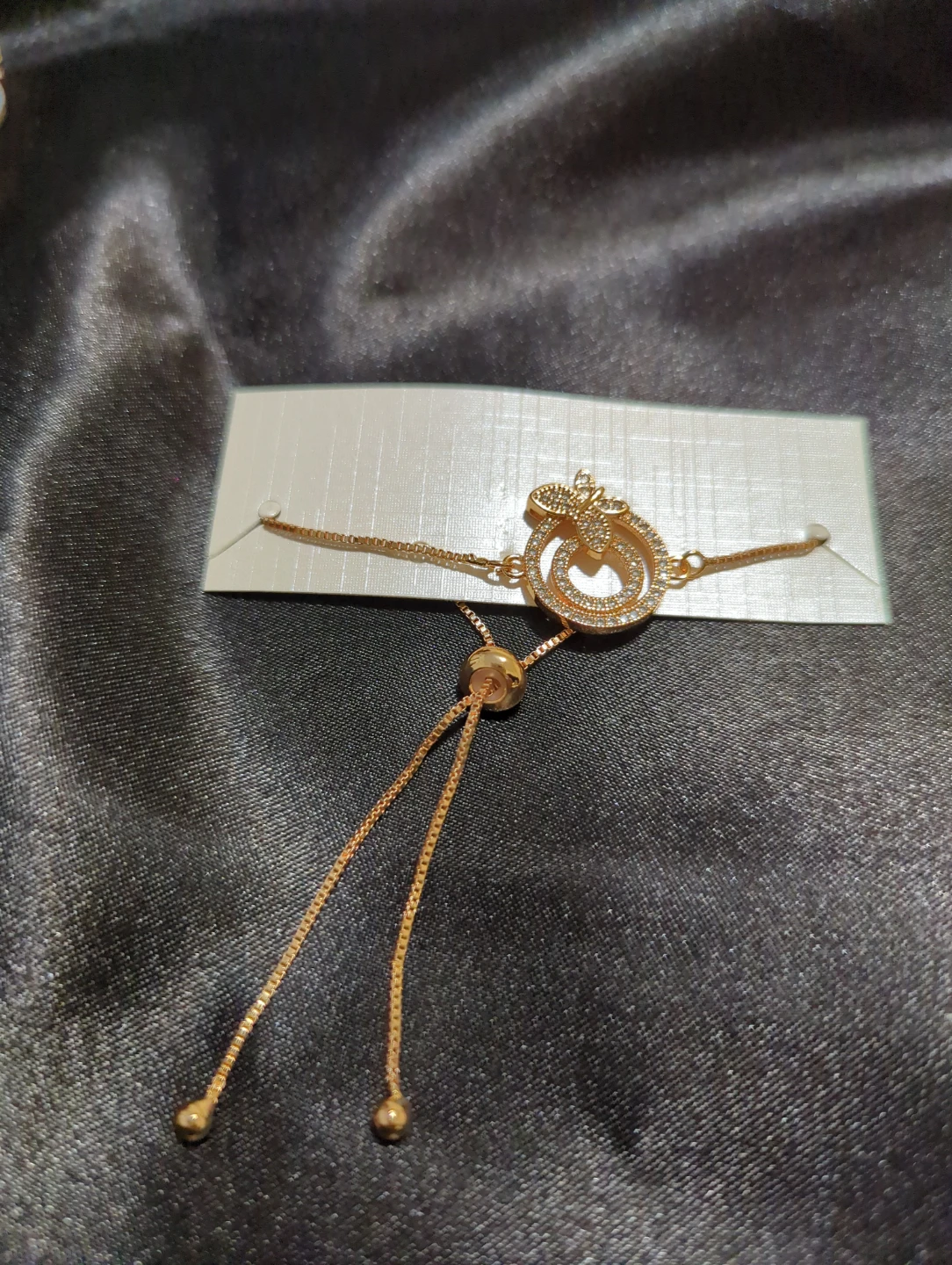 Gold-tone butterfly charm adjustable bracelet