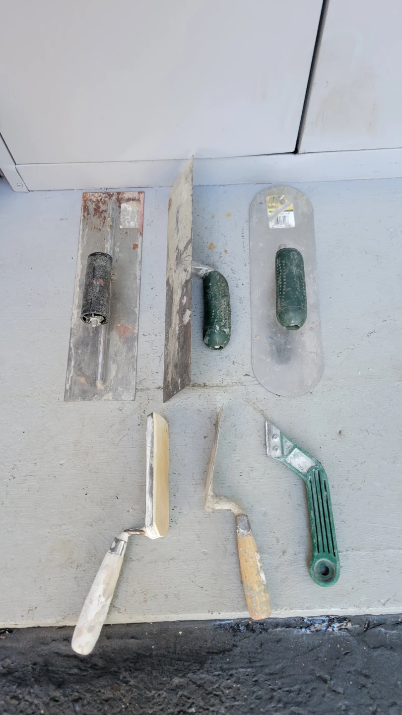 Assorted construction trowels and scrapers-$5 each