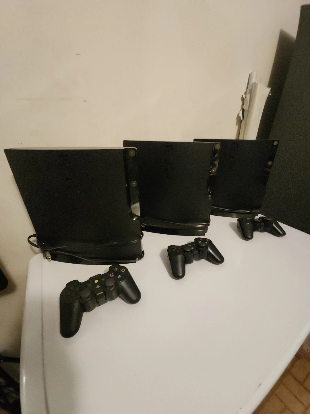 Three Sony PlayStation 3 Super Slim Consoles with Controllers - photo 2