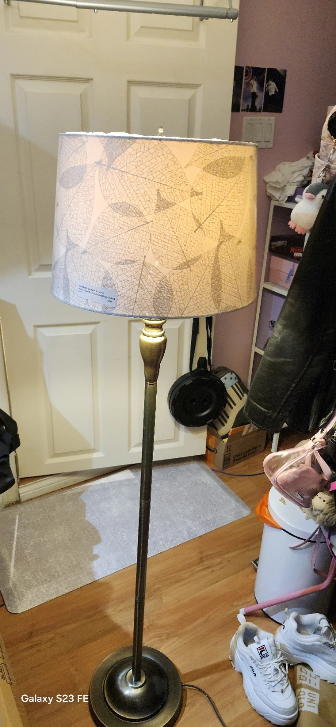 Floor lamp with patterned shade
