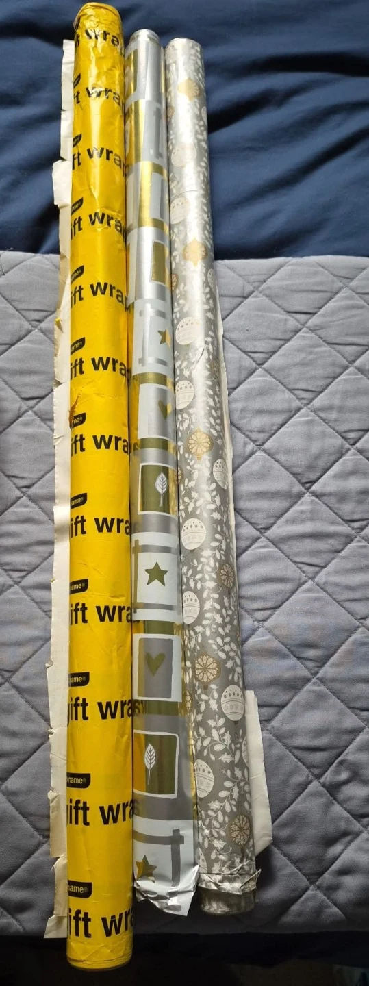 Three rolls of gift wrap