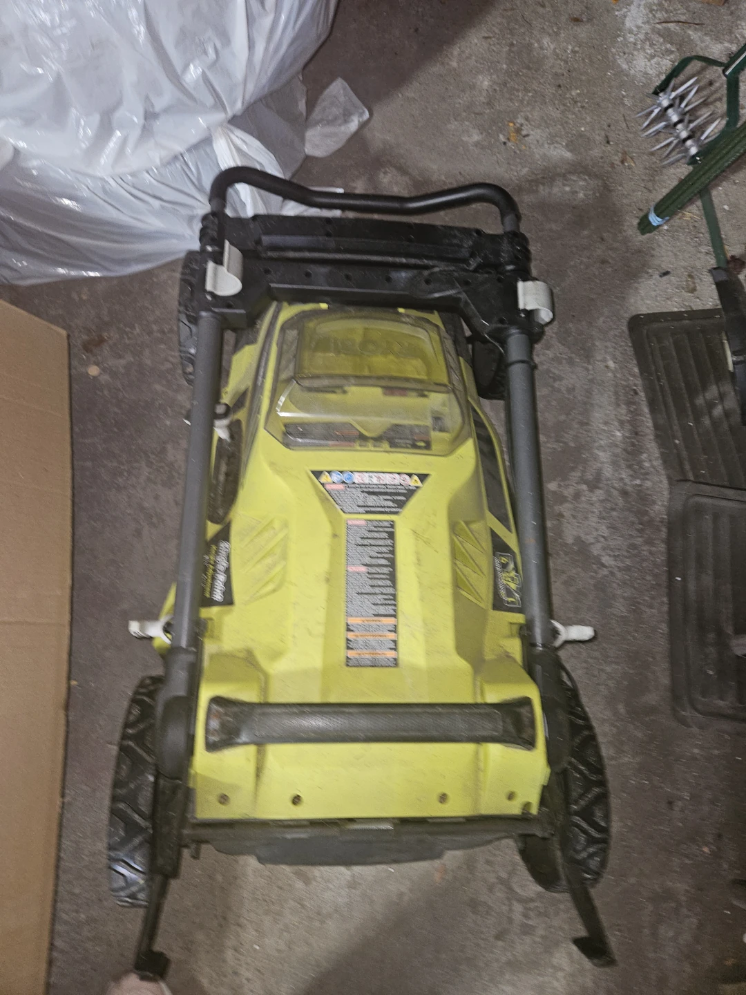 Ryobi battery powered lawn mower and weed whacker