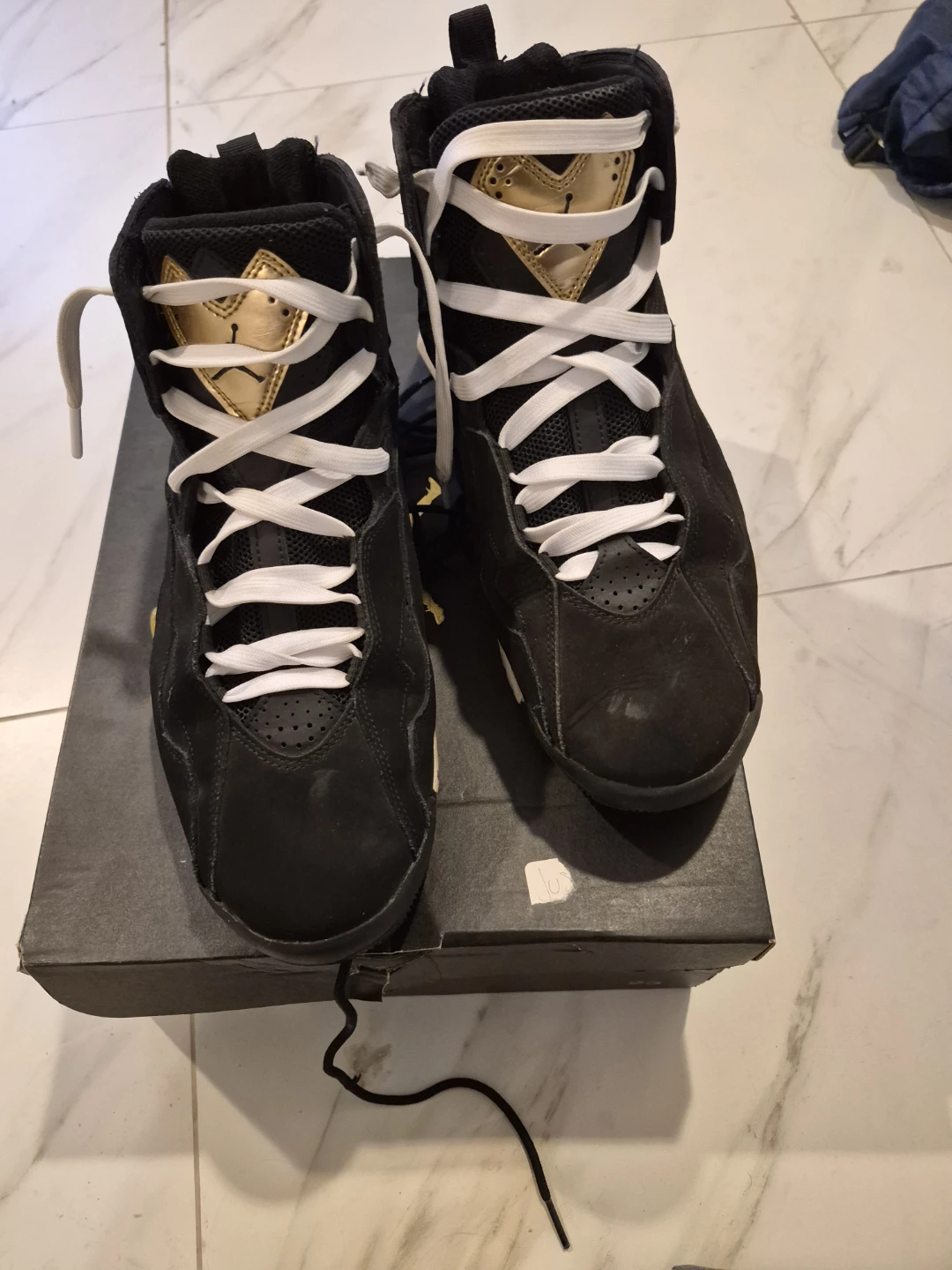 Air Jordan 7 Black and Gold Sneakers - photo 5