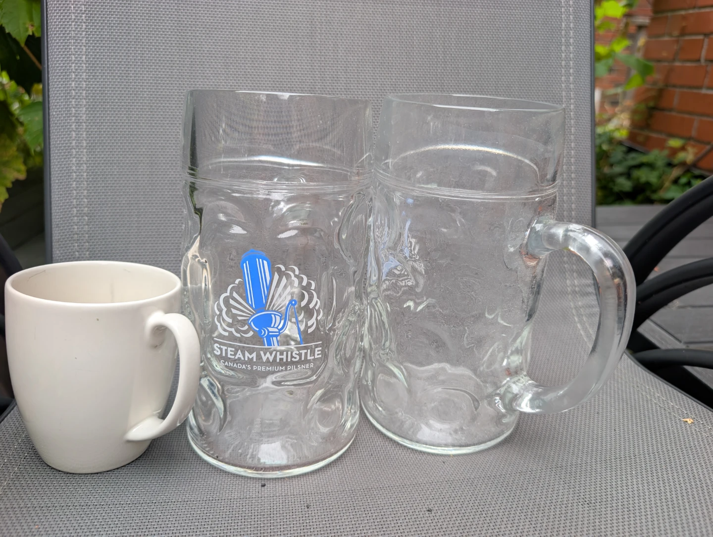 Two Steam Whistle Glass Beer Mugs