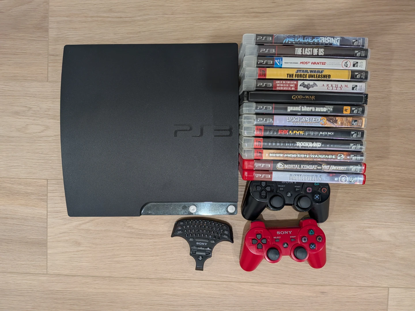 Sony PlayStation 3 Console with Controllers and Games