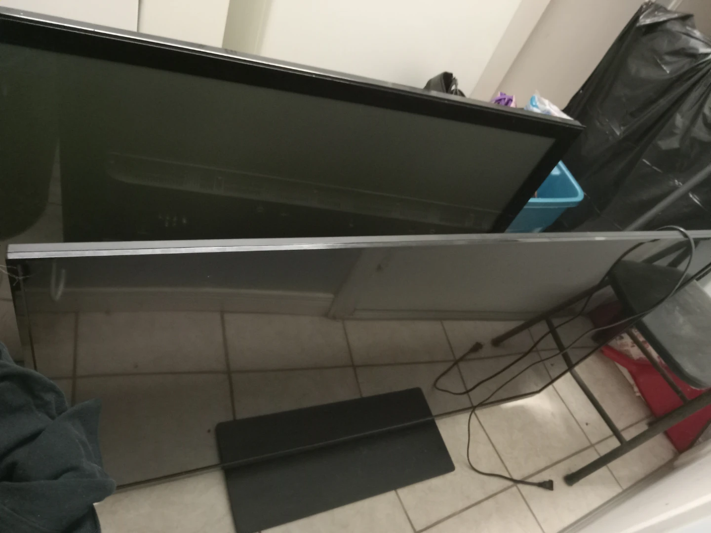 Large Black Flat Screen Television
