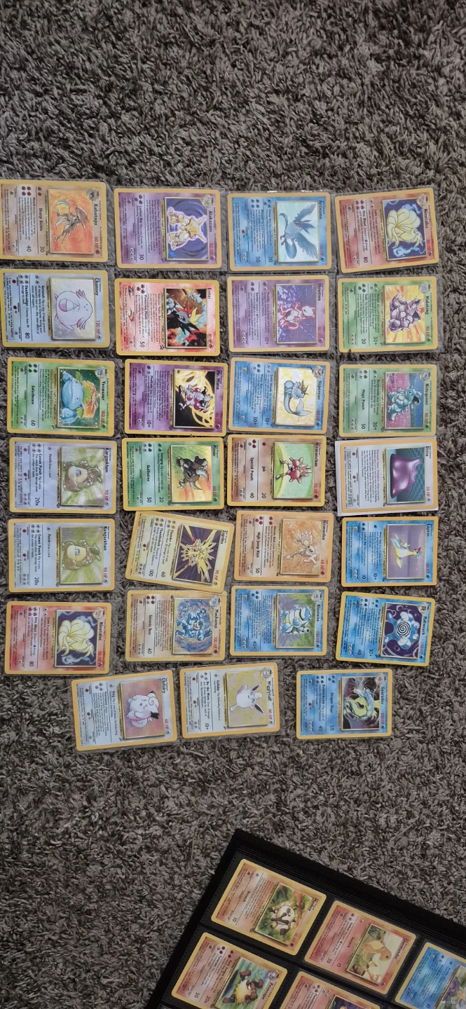 Large Collection of Vintage Pokémon Trading Cards in Binder