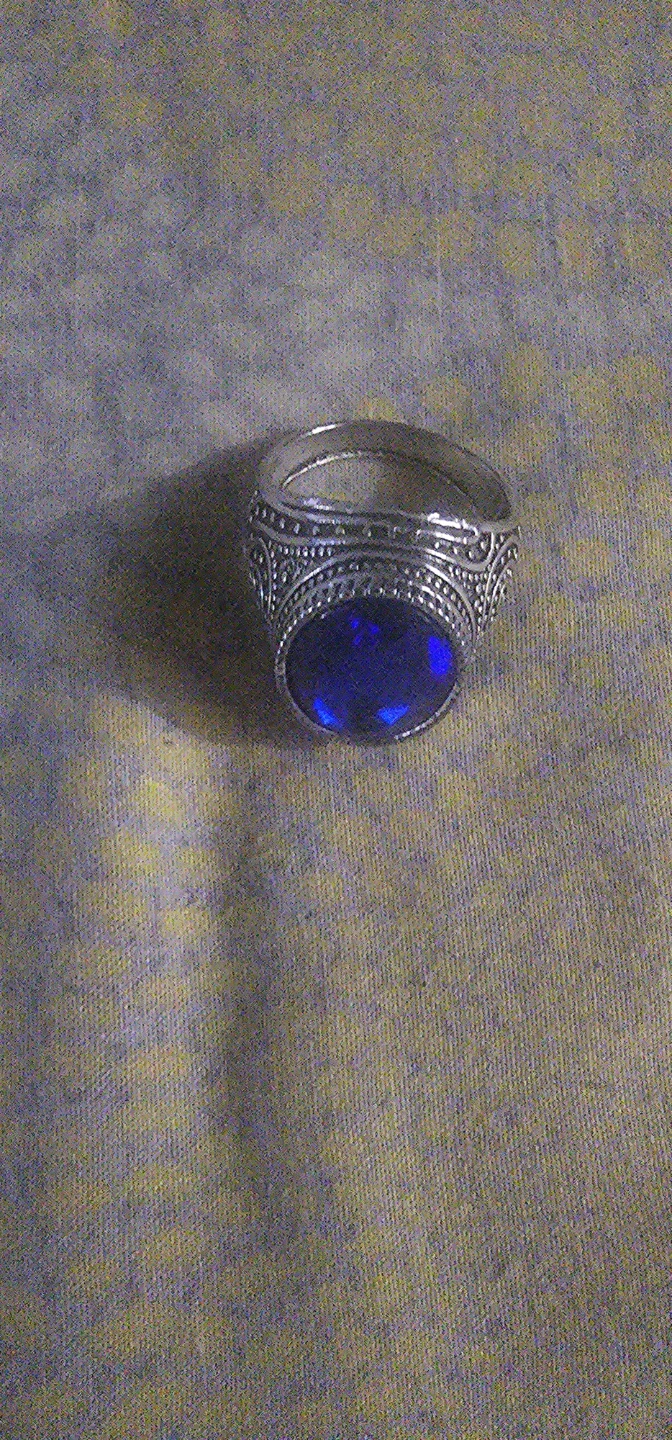 Silver-toned ring with blue stone