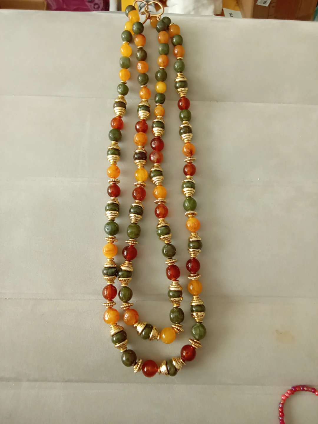Multi colored beaded double stranded necklace