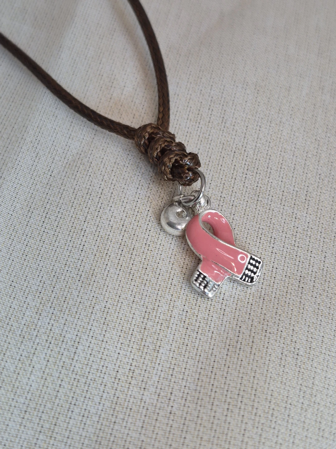 Adjustable Rope Necklace with Pink Ribbon Pendant