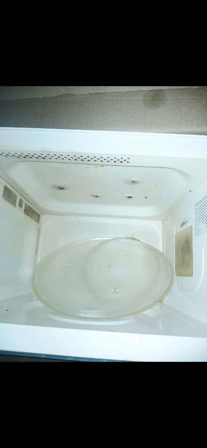Microwave, very heavy. PICK UP ONLY at exact location.